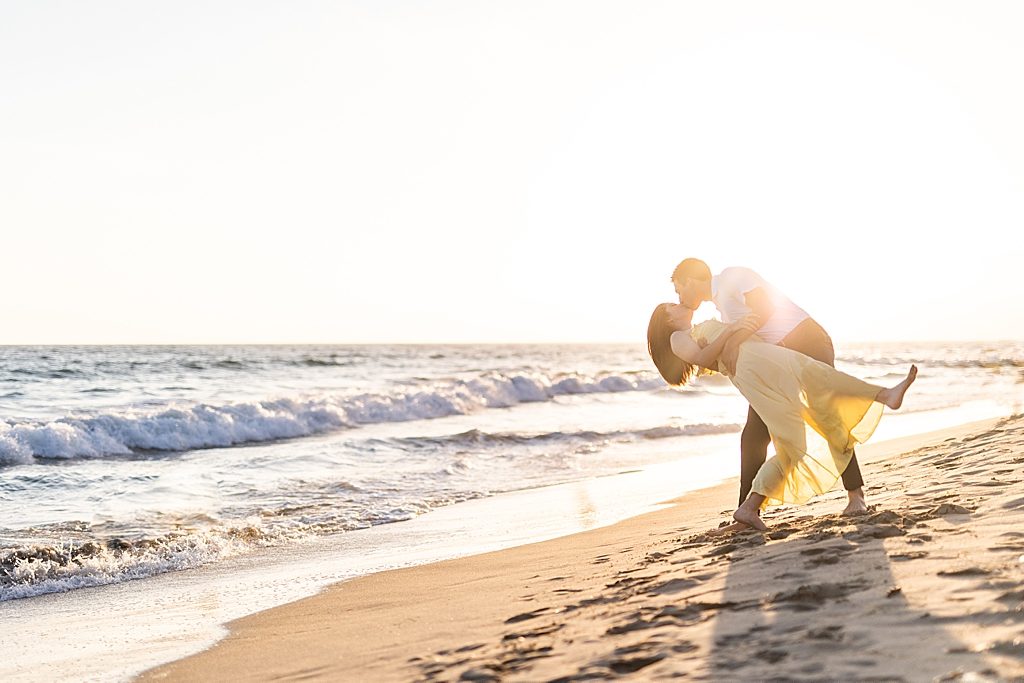 Couple kissing on beach in Santa Monica, California - Sherr Weddings