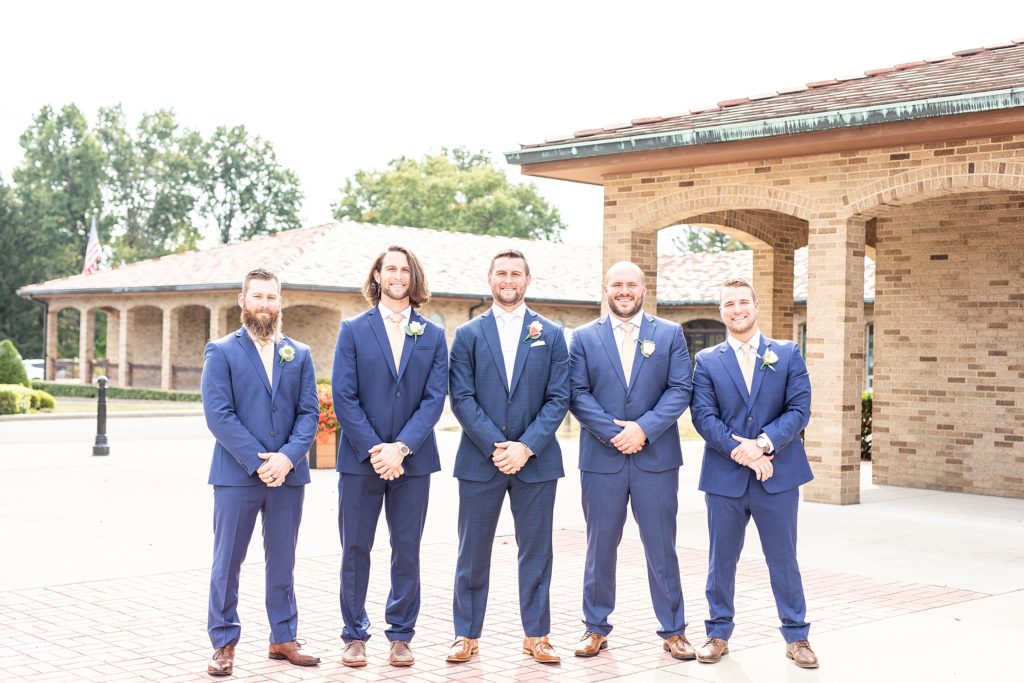 peach and sage wedding in canfield, ohio at st. michael's catholic church and the b&o station banquet hall groomsmen photo