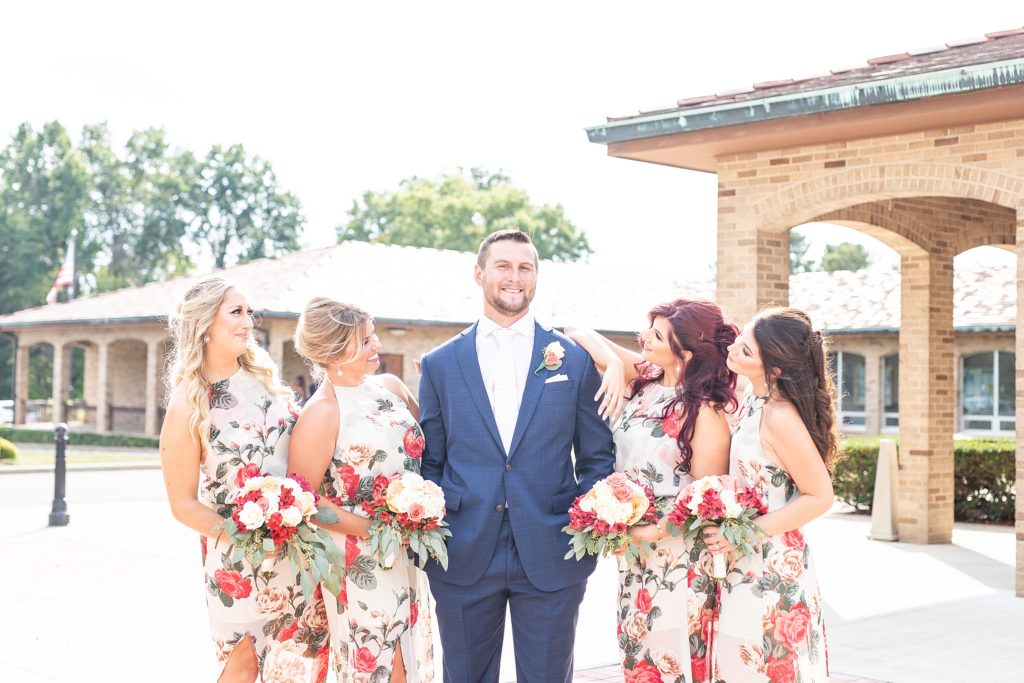 peach and sage wedding in canfield, ohio at st. michael's catholic church and the b&o station banquet hall groom with bridesmaids