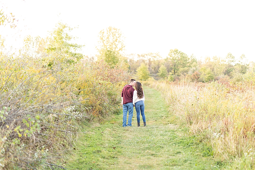 Engagement session having fun together and with their little baby at Mill Creek Preserves in fall and at Handel's enjoying ice cream