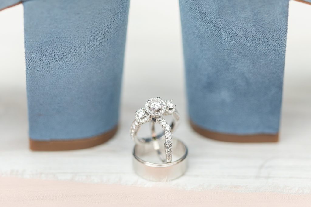 Samantha and Matthew Simko's Hudson, Ohio summer wedding at Highfield Event Center photographed by Bree Thompson Photography serving San Diego Luxury Wedding Photographer. Bridal details with bride's shoes, engagement ring, and wedding rings.
