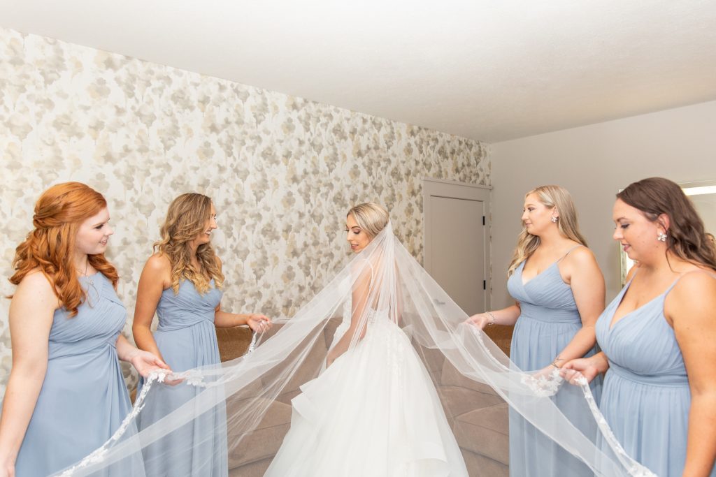 Samantha and Matthew Simko's Hudson, Ohio summer wedding at Highfield Event Center photographed by Bree Thompson Photography serving San Diego Luxury Wedding Photographer. Bride and bridesmaids getting ready.