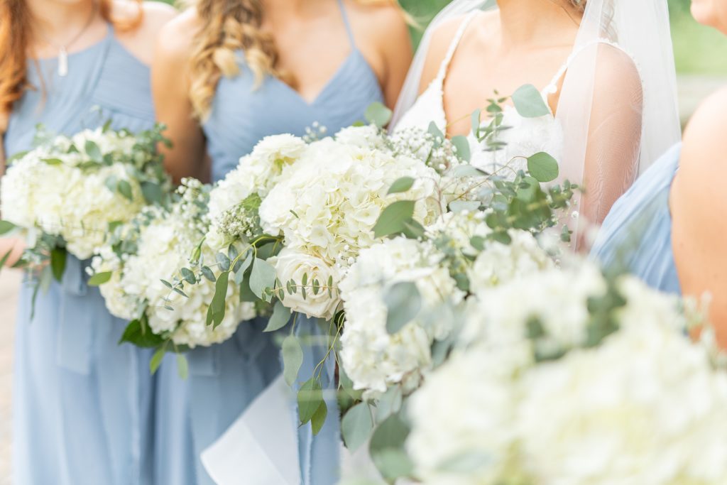 Samantha and Matthew Simko's Hudson, Ohio summer wedding at Highfield Event Center photographed by Bree Thompson Photography serving San Diego Luxury Wedding Photographer. Bride and bridesmaids floral photo by Bloom Floristy Cleveland.