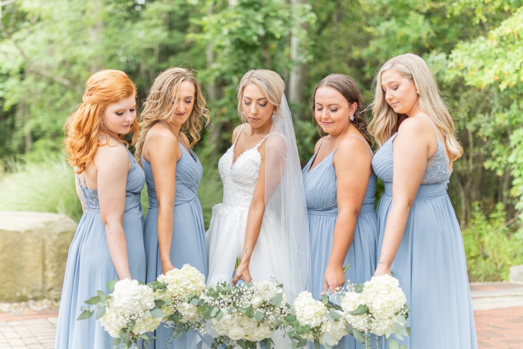 Samantha and Matthew Simko's Hudson, Ohio summer wedding at Highfield Event Center photographed by Bree Thompson Photography serving San Diego Luxury Wedding Photographer. Bride and bridesmaids photos with floral bouquets.