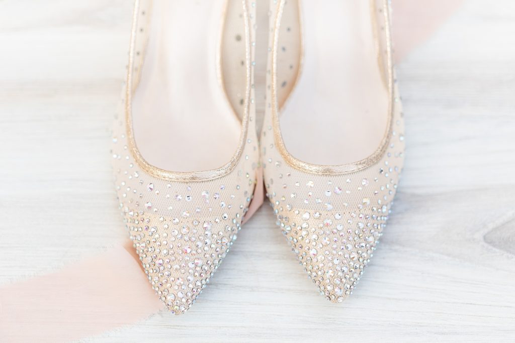 Wedding rings, earrings, and bridal shoes. Wedding details photographed by Bree Thompson Photography, based in San Diego.
