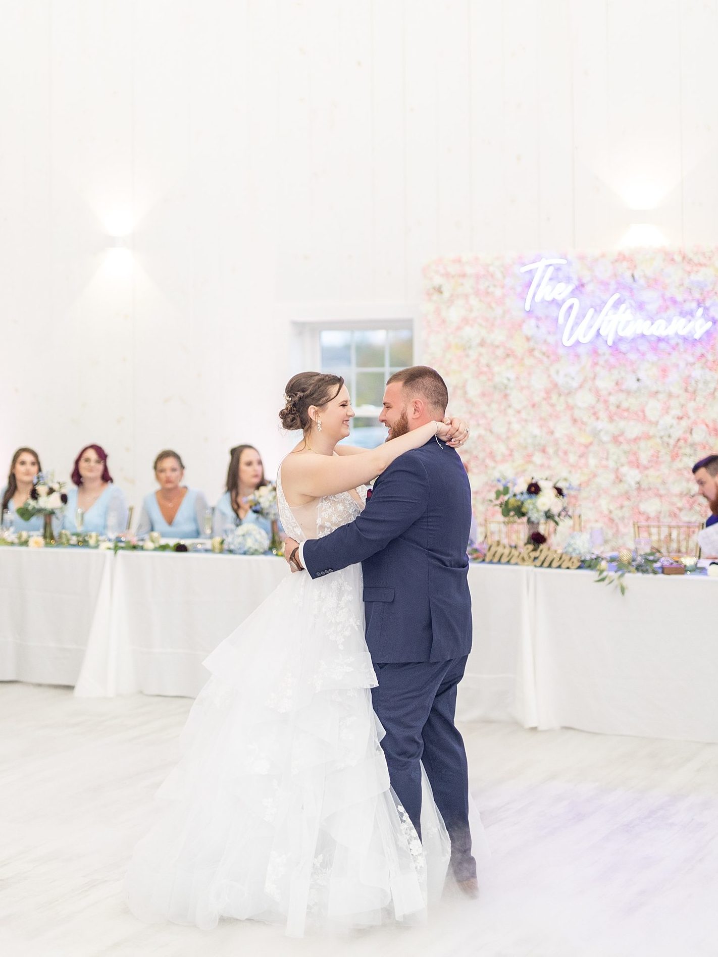First dance photo of bride and groom during wedding reception at White Rose Barn wedding venue by wedding photographer, Bree Thompson, of Sherr Weddings.