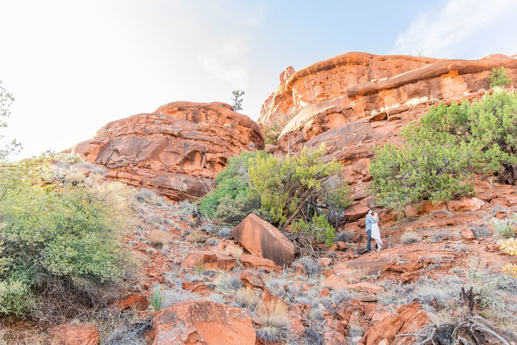 Golden hour Arizona engagement photography at Bell Rock.