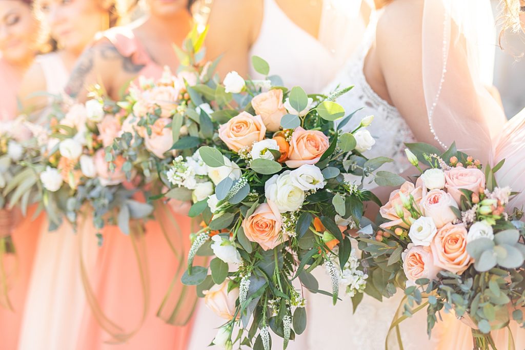 Peach flowers and greenery for bridal bouquet by Petal Pushers. 
