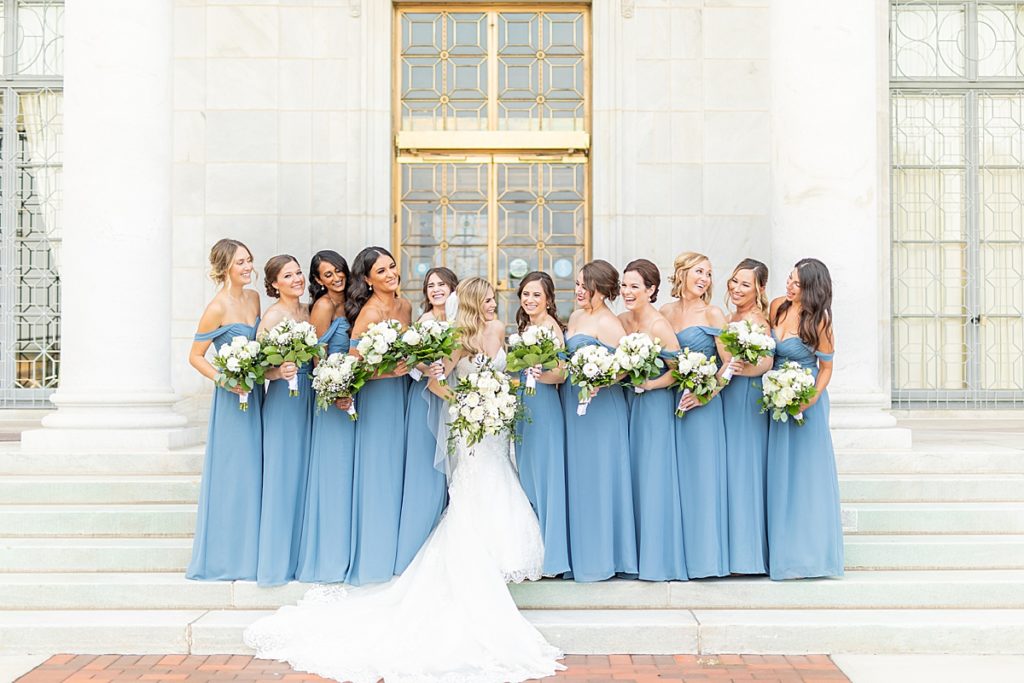High end bride and groom photos with bridesmaids and groomsmen.