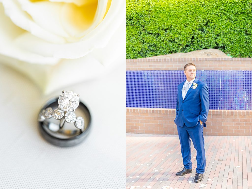 Wedding rings and groom in navy blue suit at University Club Atop Symphony Towers in downtown San Digeo, California.