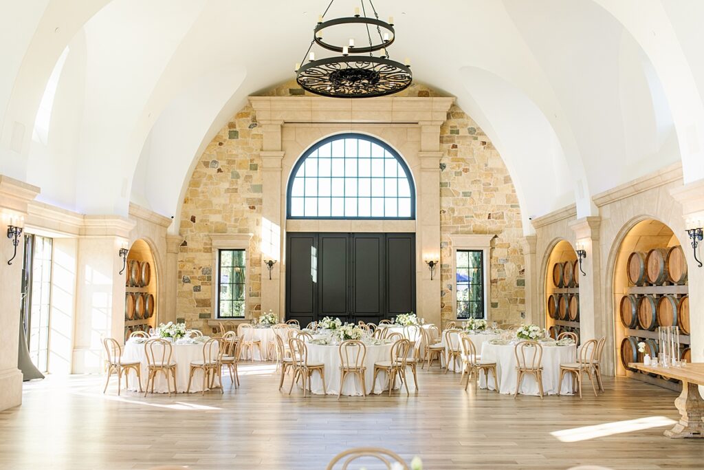 Monserate Winery wedding reception with white and green florals in Fallbrook, California.