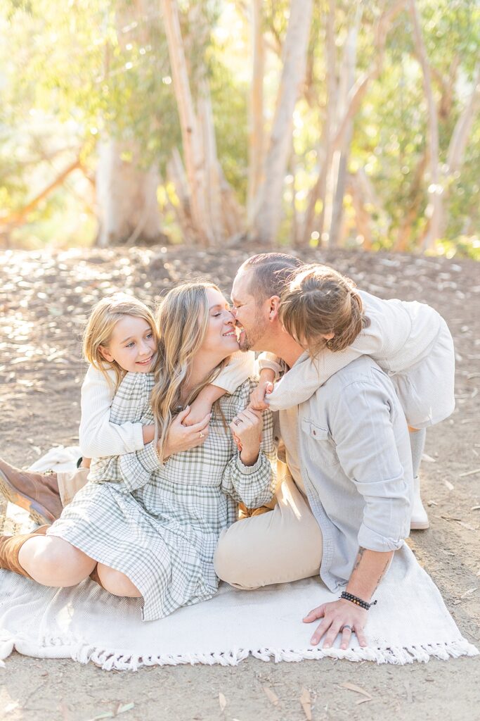 Family love in the brushes of Carlsbad, California captured by Sherr Weddings.