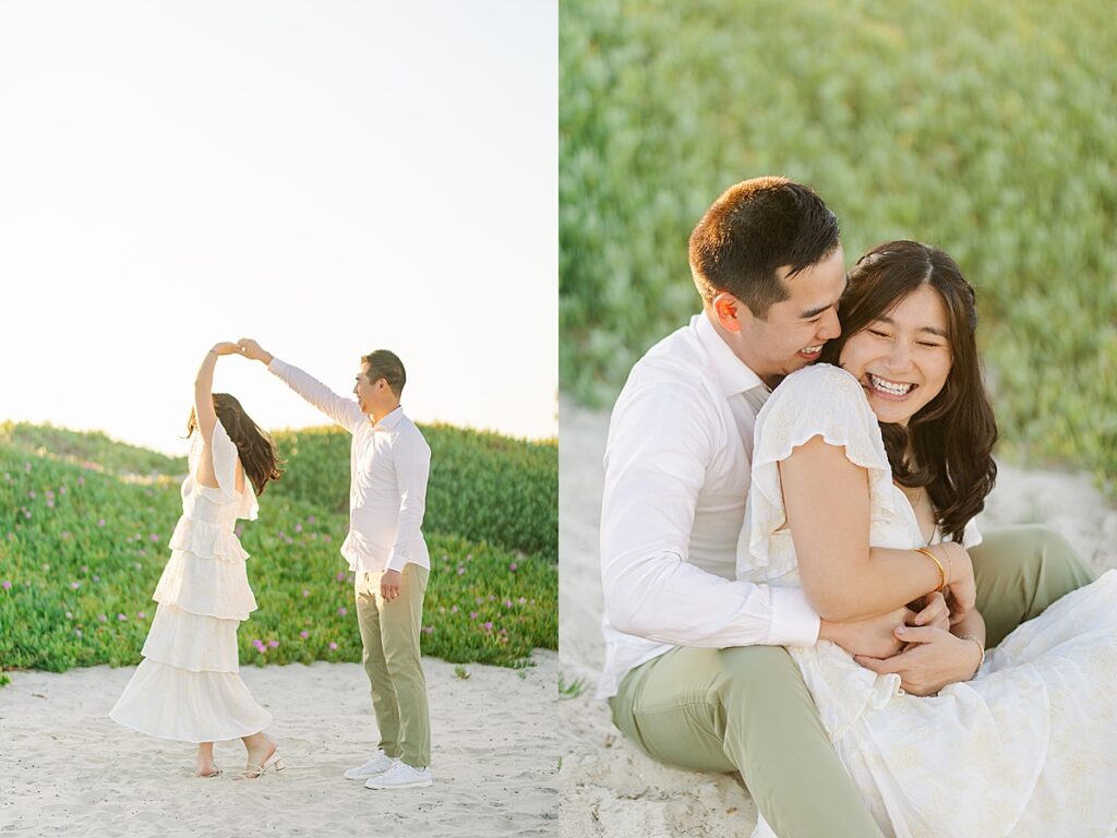 Jiaqi and Eric share a joyful laugh in the sand dunes, playfully embracing each other as they enjoy their engagement session in golden light.