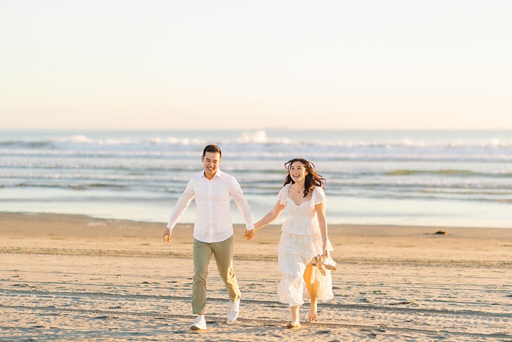 Jiaqi and Eric as they stroll down the beach, his playful energy adding to the joy of the moment.