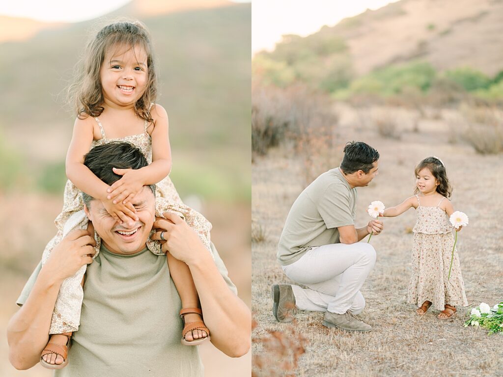 Dad holding toddler daughter on his shoulders while mom smiles beside them, hills in the background at Mission Trails Maternity Session.