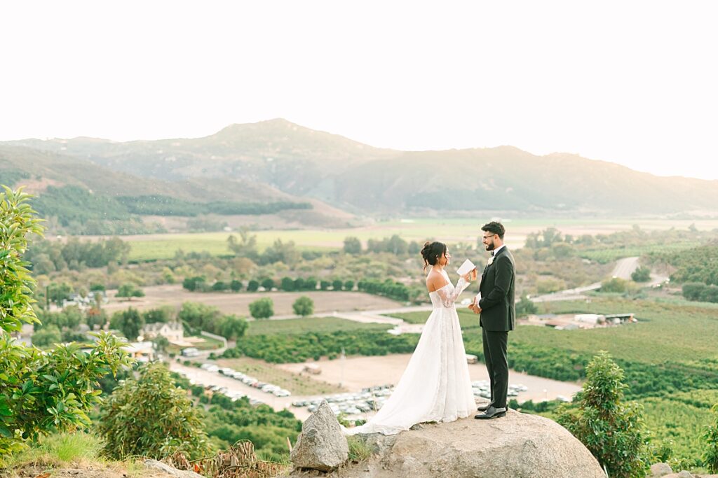 Bride and groom doing private vows at Eagle's Nest at Rancho Guejito Vineyard in Escondido.